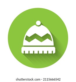 White Winter hat icon isolated with long shadow. Green circle button. Vector