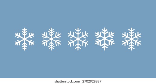 white winter snowflakes pattern on soft blue background