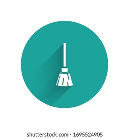 White Witches broom icon isolated with long shadow. Happy Halloween party. Green circle button. Vector Illustration