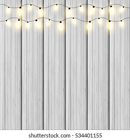 White Wooden Background With Garland Light.  Realistic luminous lamps. Vector Illustration.