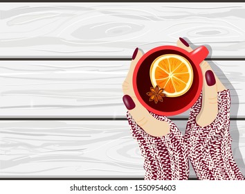 White wooden background with women's hands wearing knitted gloves holding red cup of mulled wine, hand drawn vector flat lay