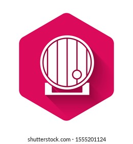 White Wooden barrel icon isolated with long shadow. Alcohol barrel, drink container, wooden keg for beer, whiskey, wine. Pink hexagon button. Vector Illustration