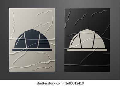 White Worker safety helmet icon isolated on crumpled paper background. Paper art style. Vector Illustration