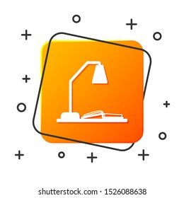 White Workplace with table lamp and open book icon isolated on white background. Table office lamp. Orange square button. Vector Illustration