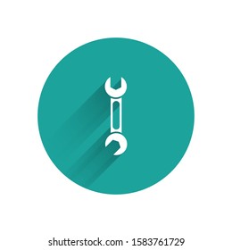 White Wrench icon isolated with long shadow background. Spanner icon. Green circle button. Vector Illustration