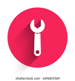 White Wrench spanner icon isolated with long shadow. Red circle button. Vector Illustration
