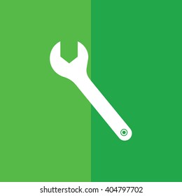 White wrench tool vector illustration. Green background