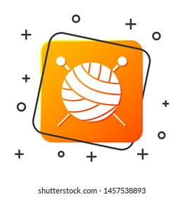 White Yarn ball with knitting needles icon isolated on white background. Label for hand made, knitting or tailor shop. Orange square button. Vector Illustration