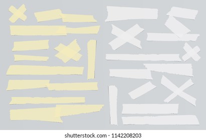 White and yellow adhesive, sticky, masking, duct tape, paper strips pieces for text on gray background