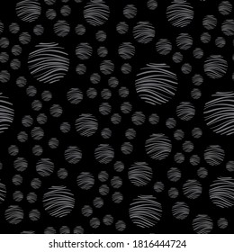 White, yellow and gray circles with textures on a black background. Seamless pattern. Vector design for fabric, packaging, paper.