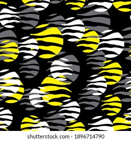 White, yellow and gray circles with textures on a black background. Seamless pattern. Vector design for fabric, packaging, paper.