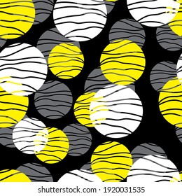 White, yellow and gray circles with textures on a black background. Seamless pattern. Vector design for fabric, packaging, paper.