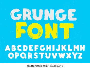 White and yellow grunge capital handwritten vector alphabet on blue background. Drawn by semi-dry brush with unpainted areas.  