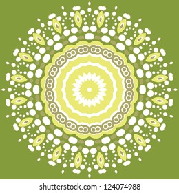 White and yellow light mandala on green background