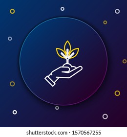White and yellow line Plant in hand of environmental protection icon isolated on dark blue background. Seed and seedling. Planting sapling. Ecology concept. Colorful outline concept. Vector