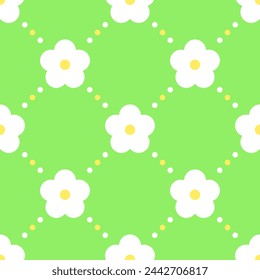 White and yellow stylized flowers on geen dotted background. Vector seamless pattern. Best for textile, wallpapers, home decoration, wrapping paper, package and your design.