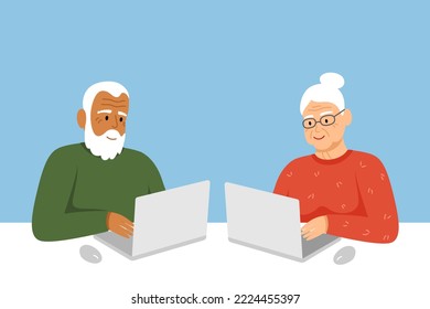 White-haired senior family man and woman, with laptop and space for text. Online education, web courses, work remotely, freelance, teaching.