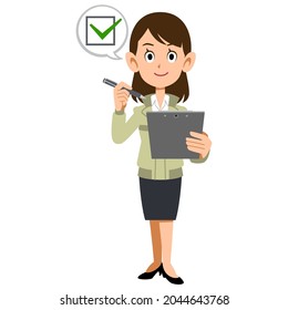 The whole body of a woman in a construction shop who fills out a check sheet