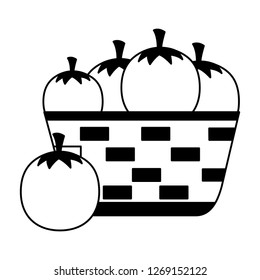 wicker basket with fresh tomatoes