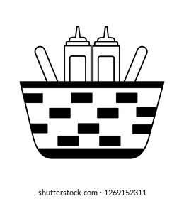 wicker basket with mustard and ketchup