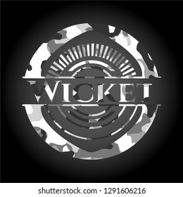 Wicket on grey camouflaged pattern