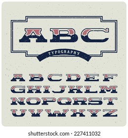 Wide retro alphabet with dusty striped letters