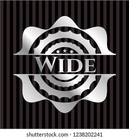 Wide silver emblem or badge