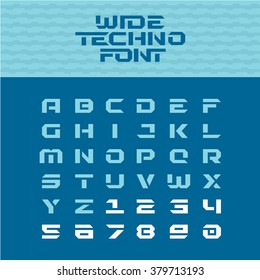 Wide techno poster font. Geometric angular letters with numbers.