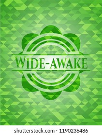 Wide-awake green emblem with triangle mosaic background