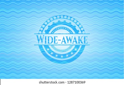 Wide-awake water representation emblem.