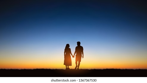 Widescreen Silhouette couple man and woman holding hand walking together under sunset sky background