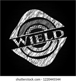 Wield written with chalkboard texture