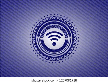 wifi signal icon inside badge with jean texture