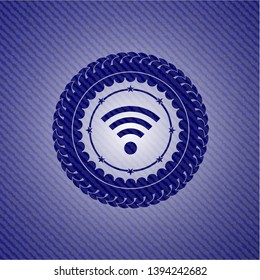 wifi signal icon inside badge with jean texture