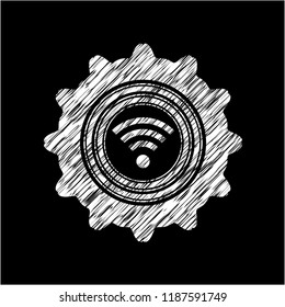 wifi signal icon inside chalkboard emblem on black board