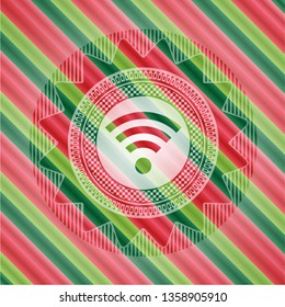 wifi signal icon inside christmas emblem.