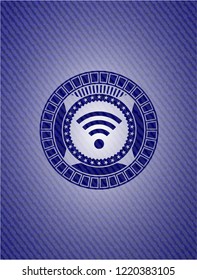 wifi signal icon inside denim background