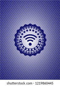 wifi signal icon inside emblem with jean texture