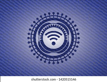 wifi signal icon inside emblem with denim texture