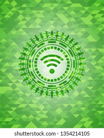 wifi signal icon inside green emblem. Mosaic background