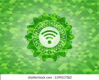 wifi signal icon inside realistic green emblem. Mosaic background