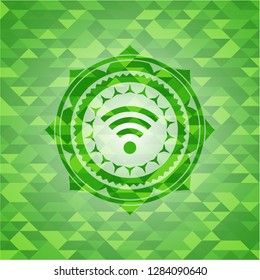wifi signal icon inside realistic green emblem. Mosaic background