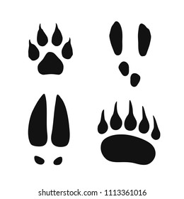 Wild animals footprints set, wolf, bear, hare and moose, simple black vector illustration isolated on white background