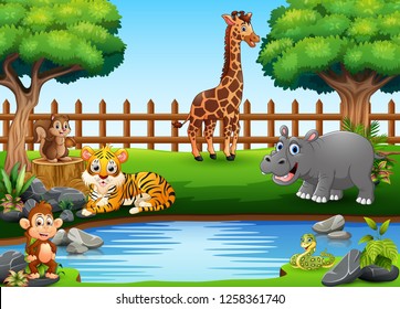 Wild animals playing on the edge of a beautiful small pond