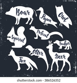 Wild animals silhouettes with lettering: boar, pigeon, owl, squirrel, polecat, badger, otter, fox, deer. 