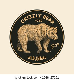 Wild animals stickers in vintage style. Forest Brown grizzly bear. Retro monochrome badge or label. Northern European Beasts. Hand drawn sketch.