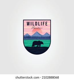 wild bear, adventure or wildlife logo vector illustration design. grizzly on the lakeside patch icon