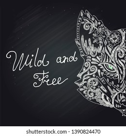 Wild beautiful fox head hand drawn in chalk on a black background. Fashion in a vector illustration