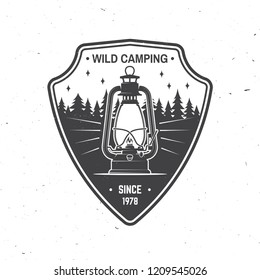 Wild camping. Vector illustration. Concept for shirt or logo, print, stamp or tee. Vintage typography design with camp lantern and forest silhouette.