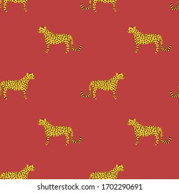Wild cats seamless vector pattern. Leopards, jaguar and cheetah repeating background. Wild African animals on a red background. Wild cats repeating design.